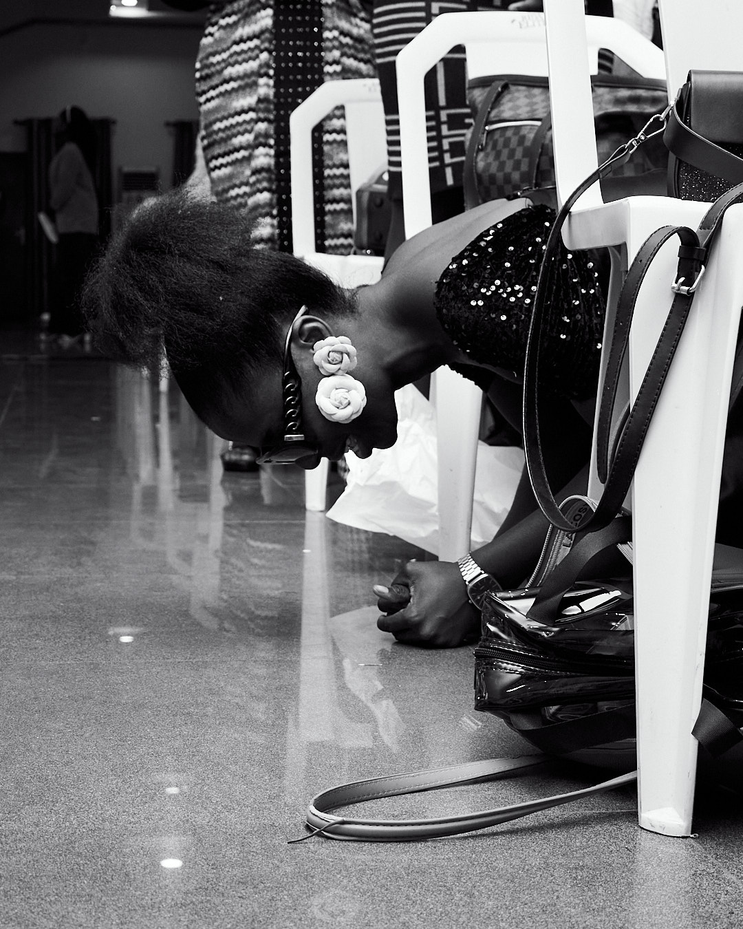 Lady kneeling down in worship
